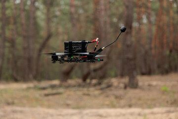 Obraz premium drone flies into the forest