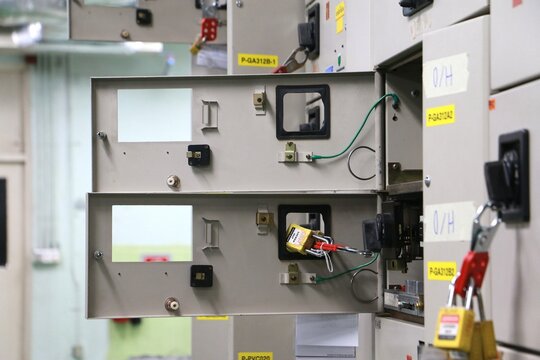 Select focus circuit breaker in Electric room on industrial, Rocker switch for start or stop motor.	