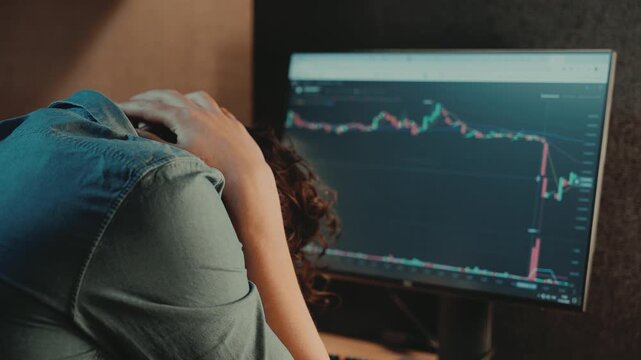 Cryptocurrency and stock online trading digital finance. Investor analyzes financial market charts data graphs. Global market analysis brokerage services. man watches exchange rate collapse in stress