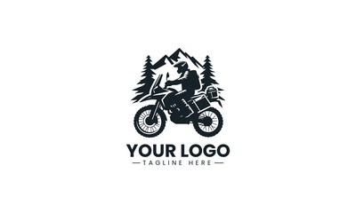 Obraz premium An adventure motorcycle rider travels through a mountain landscape scenic