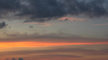 Fototapeta premium Sunset Sky with Orange and Dark Clouds