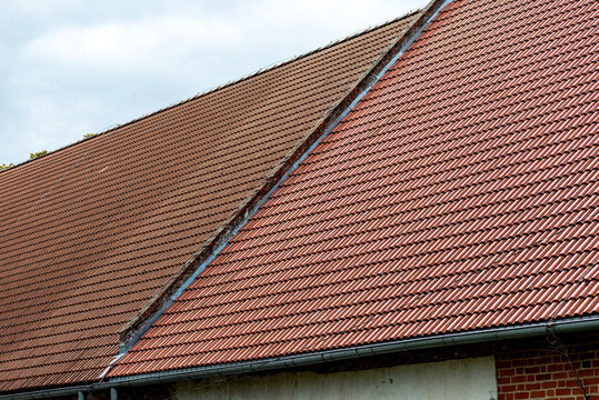 Clay roof tiles on historic building architecture