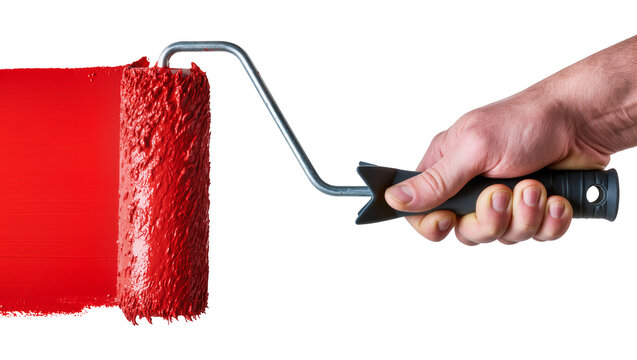 Hand holding paint roller applying red paint on wall