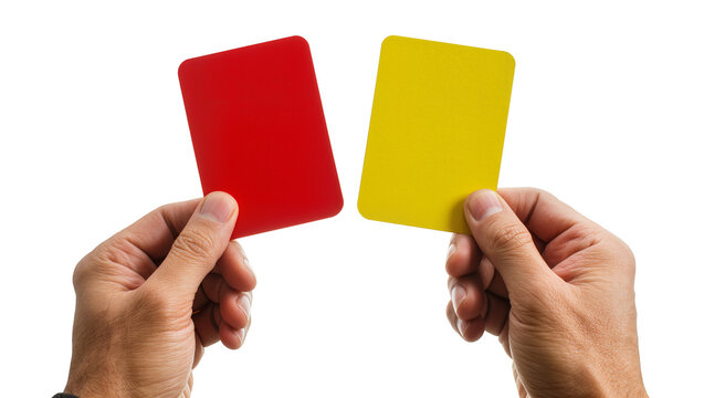 Hands holding red and yellow soccer cards