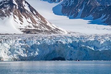 Glacier meeting the sea at Bjornfjorden, Svalbard, Norway © Angela