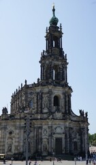 Fototapeta premium Vertical image of Dresden Cathedral, or the Cathedral of the Holy Trinity, a historic catholic church with a landmark Baroque spire in Dresden, Germany