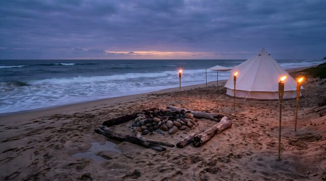 Charming beach scene with a tent, campfire, and serene waves at sunset, perfect for outdoor relaxation.
