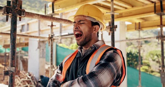 Construction site, man and bored with yawn for architecture, renovation and civil engineering. Tired contractor, burnout and low energy with industrial overtime, arms crossed or maintenance fatigue