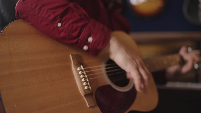 Strumming Hand on Martin Acoustic Guitar &mdash; Sound Hole Angle 