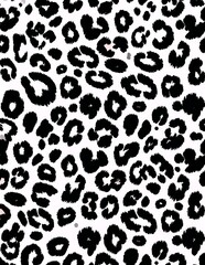 Fototapeta premium Bold Black Leopard Spot Pattern Covering White Background