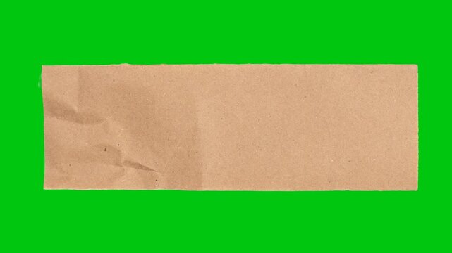Animated brown torn paper strip on green screen background, crumpled kraft paper texture reveal, stop motion collage element with alpha channel, handmade scrapbook transition overlay.