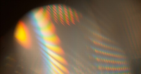 Fototapeta na wymiar Abstract RGB prism lens flare with colorful light refraction and optical distortion. Creative cinematic background suitable for visual effects, overlays and modern digital design.