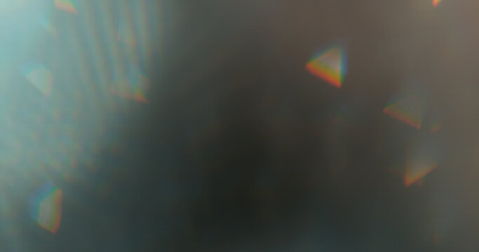Abstract RGB prism lens flare with colorful light refraction and optical distortion. Creative cinematic background suitable for visual effects, overlays and modern digital design.