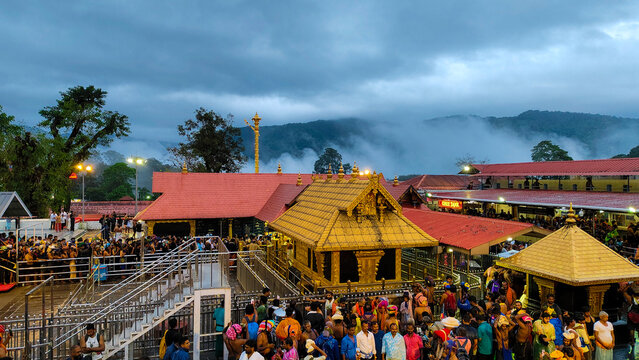 Sacred Sabarimala Ayyappa Temple with Pilgrims and Mist-Covered Western Ghats, Kerala