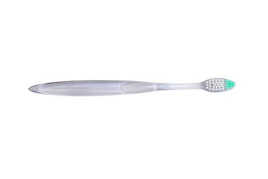 Transparent plastic toothbrush isolated on white background