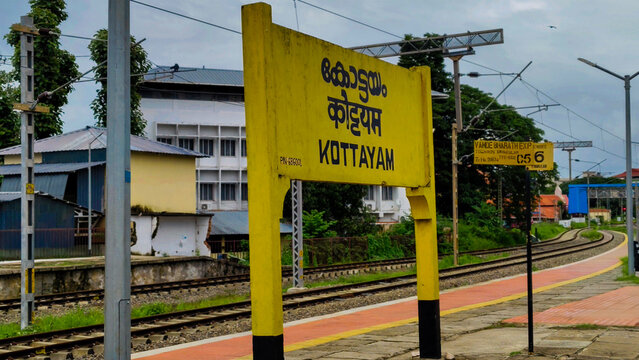 Kottayam Railway Station Platform with Bilingual Signboard in Kerala, India