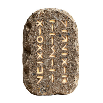 Ancient Stone Tablet with Glowing Runic Symbols: A Blend of Prehistoric and Futuristic Design