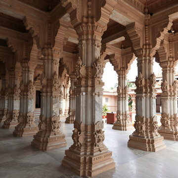 Intricate Marble Pillars Inside a Jain Temple