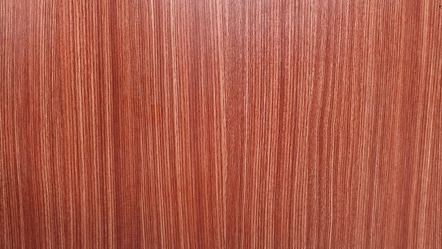Reddish brown wood texture coating with fine vertical lines pattern, furniture HPL surface.