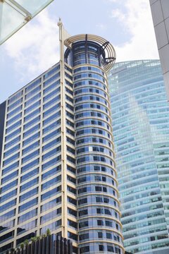 SINGAPORE CITY, SINGAPORE - MARCH 13, 2024: 30 Raffles Place formerly called Chevron House and Caltex House, an office building in Downtown Core district of Singapore.