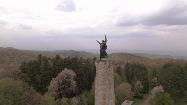 Cinematic drone shot of Freedom Monument on Iriski Venac, Fruska Gora. Aerial video of the iconic Yugoslav WWII spomenik memorial statue surrounded by lush green forests.Fruska Gora,Serbia 16.04.2026