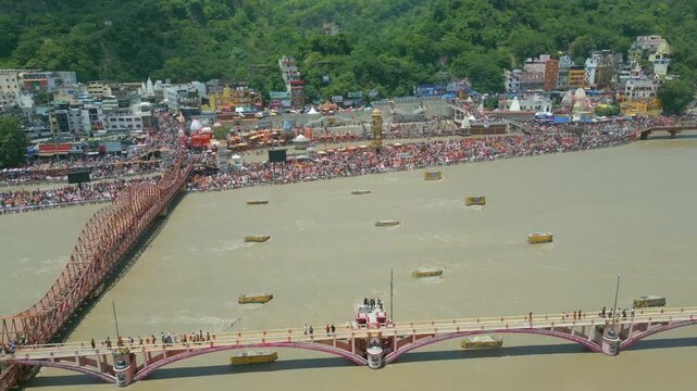 The majestic aerial view captures Haridwar's core: the sacred Har Ki Pauri ghat on the Ganges, the colossal Lord Shiva Statue, and the hilltop Mansa Devi Temple