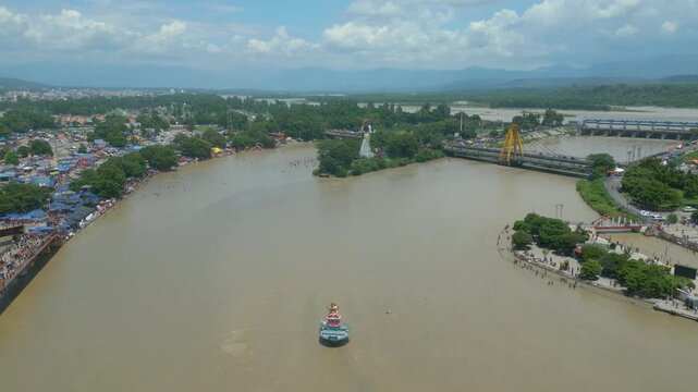 The majestic aerial view captures Haridwar's core: the sacred Har Ki Pauri ghat on the Ganges, the colossal Lord Shiva Statue, and the hilltop Mansa Devi Temple