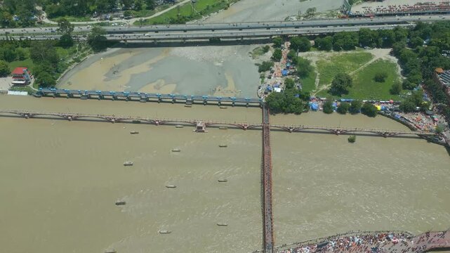 The majestic aerial view captures Haridwar's core: the sacred Har Ki Pauri ghat on the Ganges, the colossal Lord Shiva Statue, and the hilltop Mansa Devi Temple