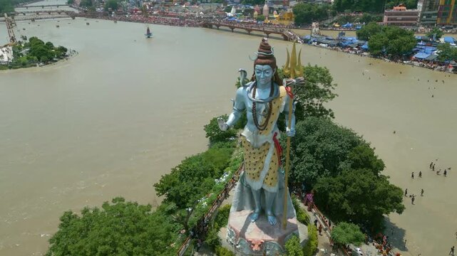 The majestic aerial view captures Haridwar's core: the sacred Har Ki Pauri ghat on the Ganges, the colossal Lord Shiva Statue, and the hilltop Mansa Devi Temple