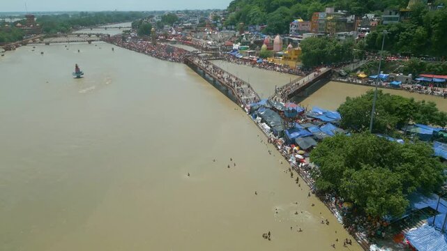 The majestic aerial view captures Haridwar's core: the sacred Har Ki Pauri ghat on the Ganges, the colossal Lord Shiva Statue, and the hilltop Mansa Devi Temple