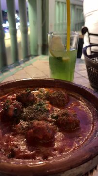 Dolly shot of moroccan meatball tajin, Morocco tourism