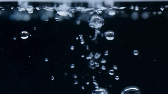 Bubbles rising in clear water, creating a mesmerizing underwater scene. Represents tranquility and the beauty of nature's elements
