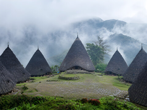 Traditional Ngada Mbaru Niang towering cone-shaped thatched roof house