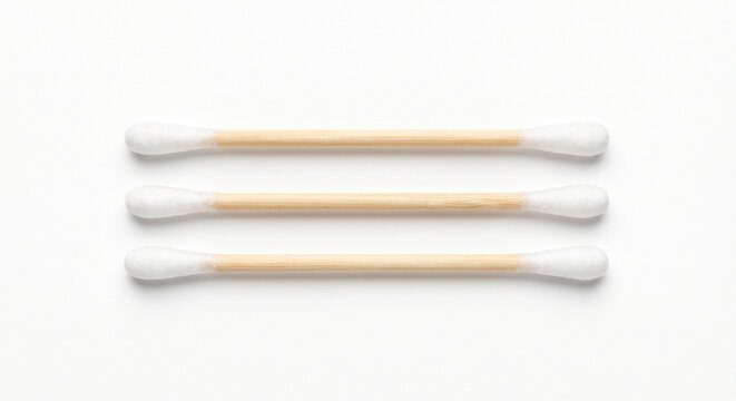 Eco-friendly bamboo cotton swabs isolated on pure white background