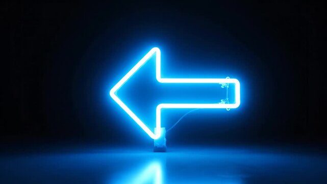 Bright blue neon arrow sign pointing left on dark background