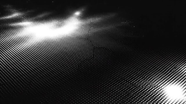 Digital grid pattern with glowing white dots on a dark background