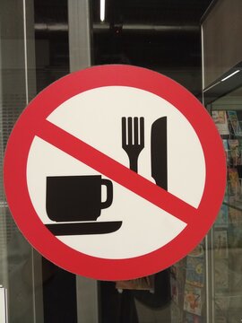 Sign prohibiting eating in this place