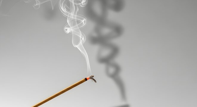 Aromatic incense stick, burning joss stick with smoke, zen meditation