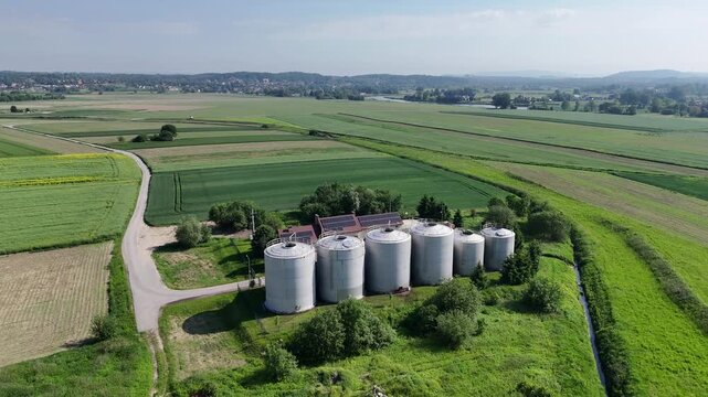 Aerial Drone View of Industrial Storage Tanks in Rural Agricultural Landscape