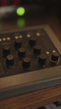 MIDI Control Surface &mdash; Vertical Slow Pan with Green LEDs in Background