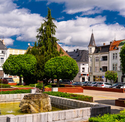 2025-05-04  Sunny day on market square in Krapkowice Poland with historic © fotomaster