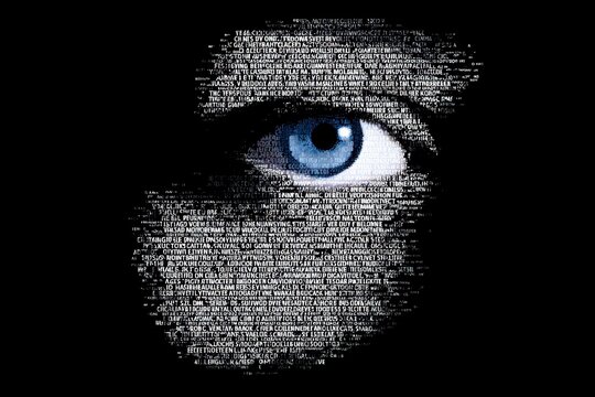 a closeup of a face made from tiny white letters, with only one blue eye in the center, on a black background