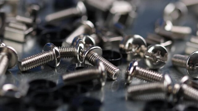Metal screws for fastening equipment. Soft focus. Close-up. 
