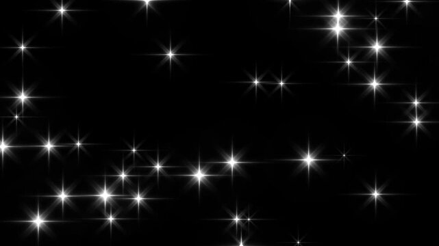 Ultra HD Moving and Blinking Twinkling Star Animation on a Black Screen Background. White Glitter Sparkle Light Effects with Magical Bokeh Lights for Festive Celebration. Alpha Channel 4K Animation