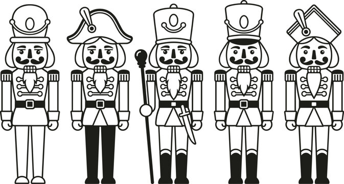 Five black and white nutcracker soldier toys in different outfits for christmas