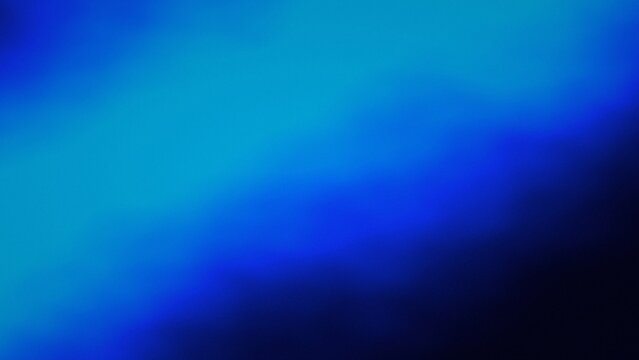 Abstract blue gradient soft light diffusion dark background flowing.