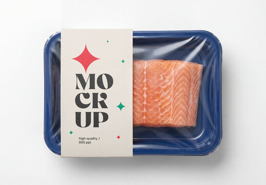 Top view of a fresh salmon fish fillet food packaging tray mockup with a plastic wrap film and a vertical paper sleeve isolated on a white background