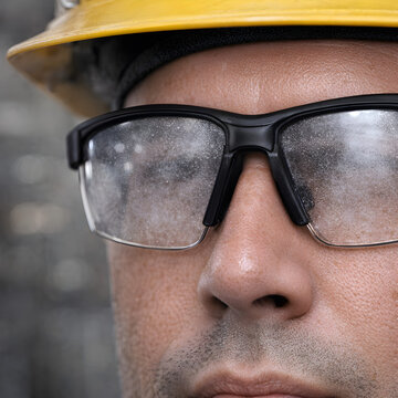 Industrial Worker Wearing Hard Hat and Safety Glasses Close Up, Human Factors Situational Awareness and Safety Culture Concept for Operational Safety in Industrial Workplace