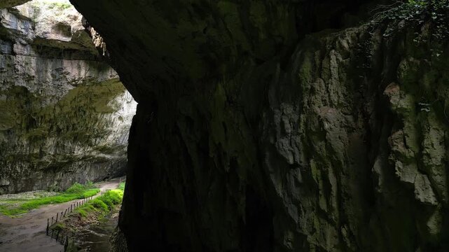 Cinematic Aerial Reveal of Devetashka Cave and Natural Skylights