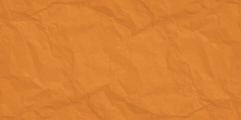 Fototapeta premium Crumpled orange paper texture background. Creased textured abstract kraft material sheet for design mockups.